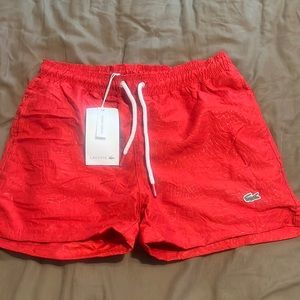 Men lacoste swimming trunks size medium just in time for the summer